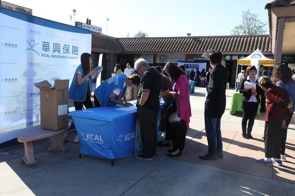 Attendees check in at the KCAL registration table at the 2020 open enrollment health fair