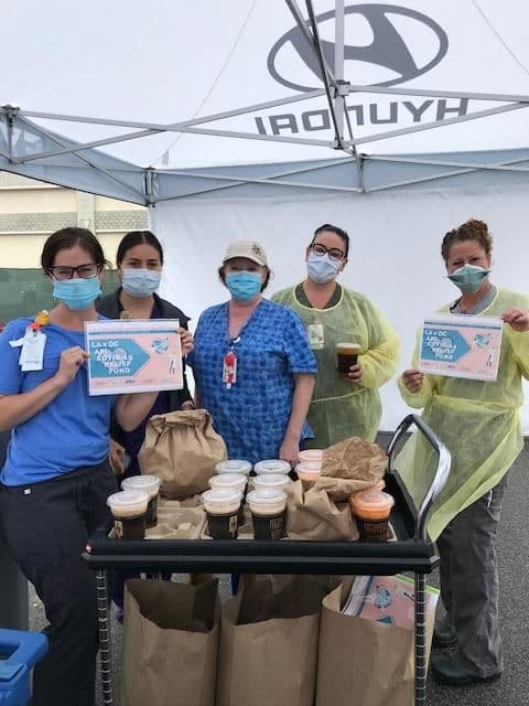Frontline healthcare workers with meals donated by the LA x OC API COVID-19 Relief Fund