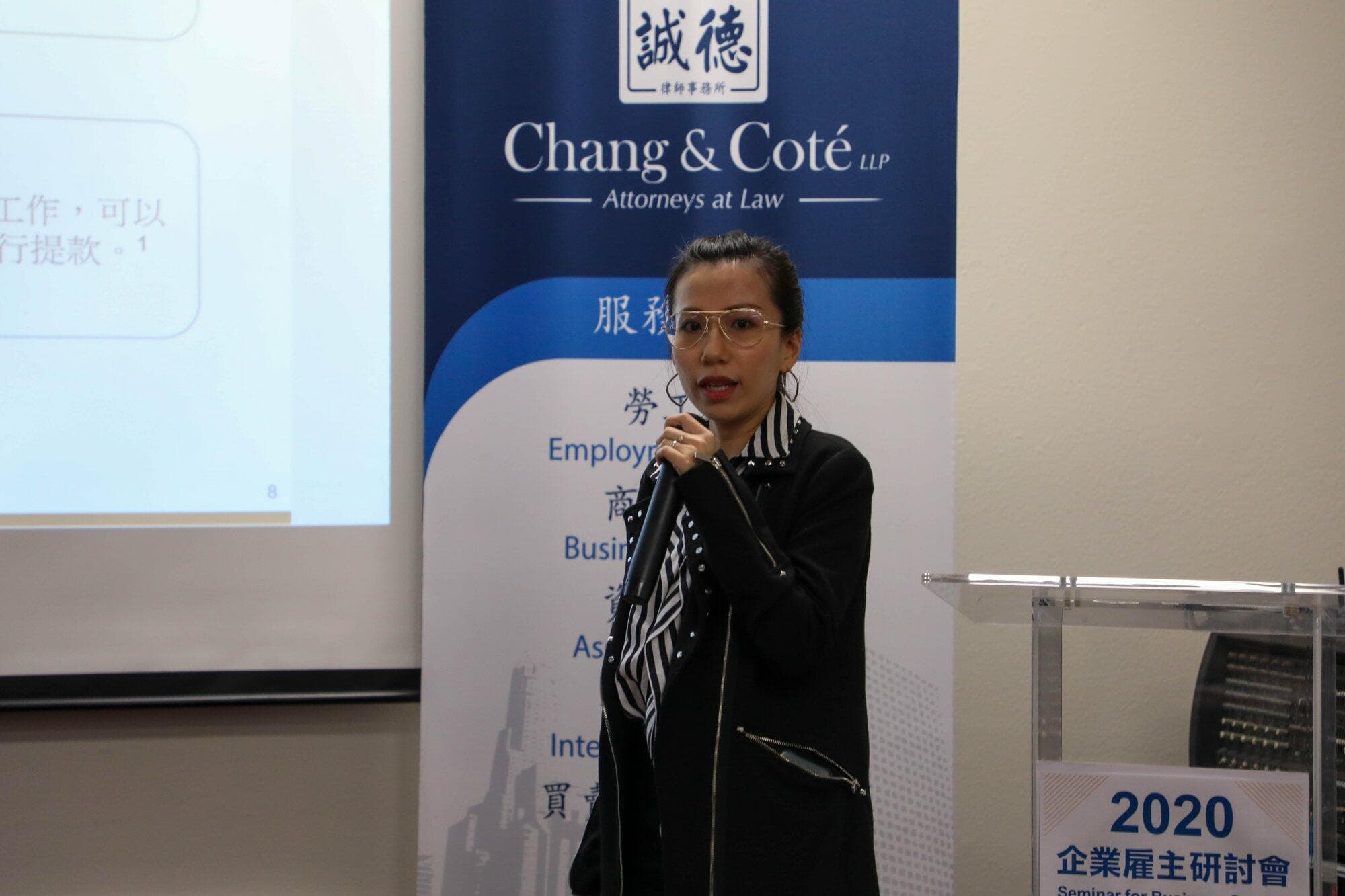Anita Pang speaks with a microphone at KCAL's 2020 Seminar for Business Owners