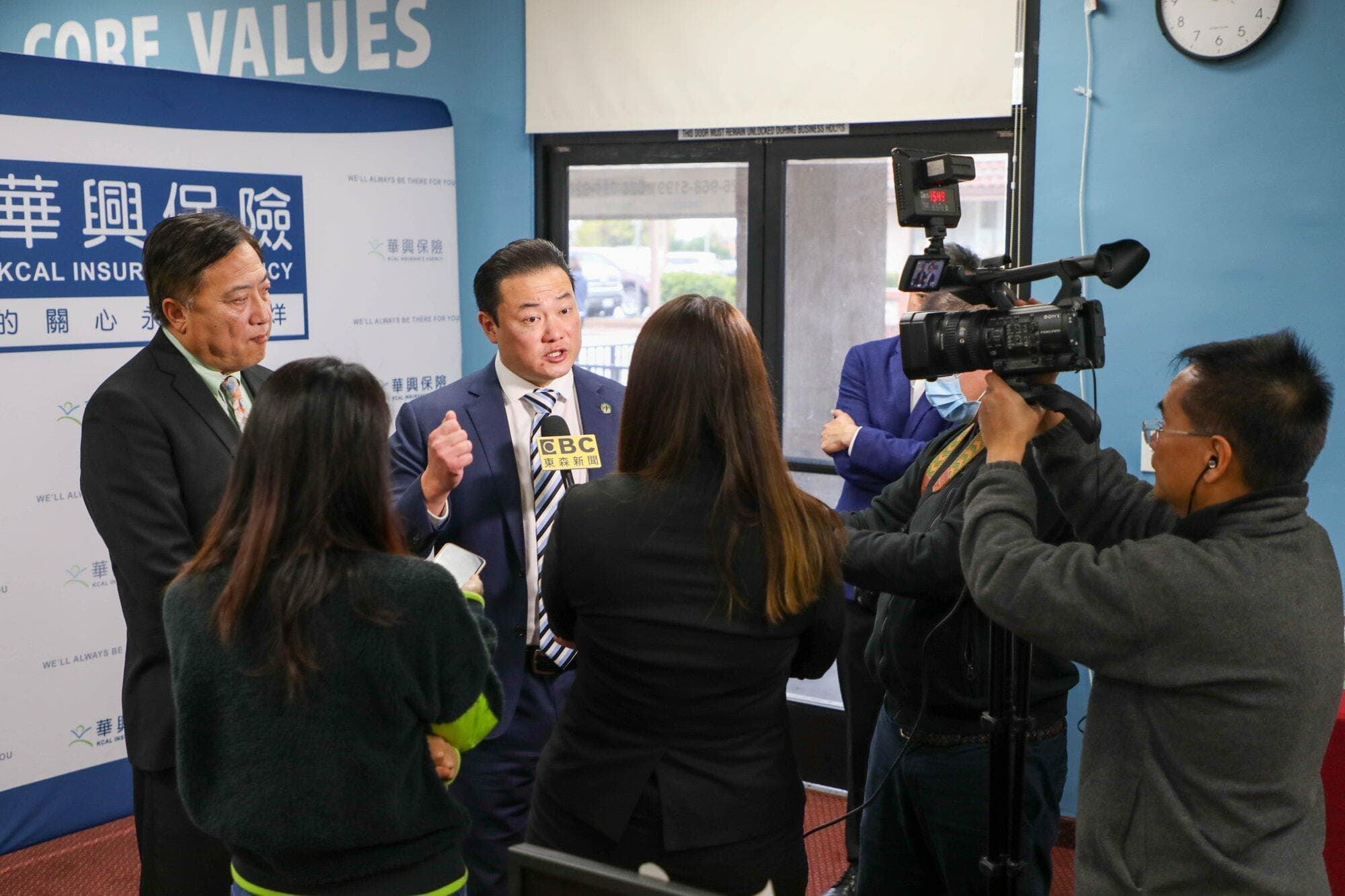 Speakers answering questions from TV reporters at KCAL Insurance during the COVID-19 community press conference