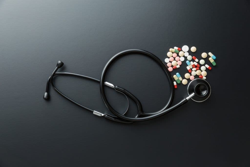 Stethoscope and pills.