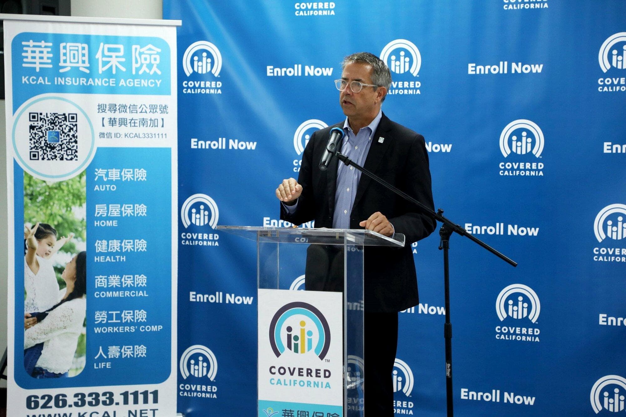 Covered California Executive Director Peter Lee speaks at a KCAL and Covered California event