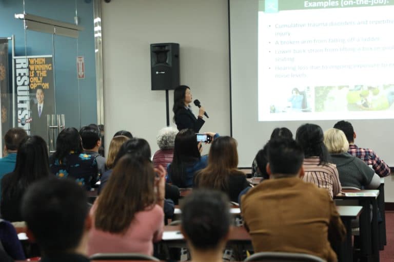 Emery Lee, Commercial Insurance Advisor at KCAL Insurance Agency, presenting to a full room at the 2019 Business Owners Seminar