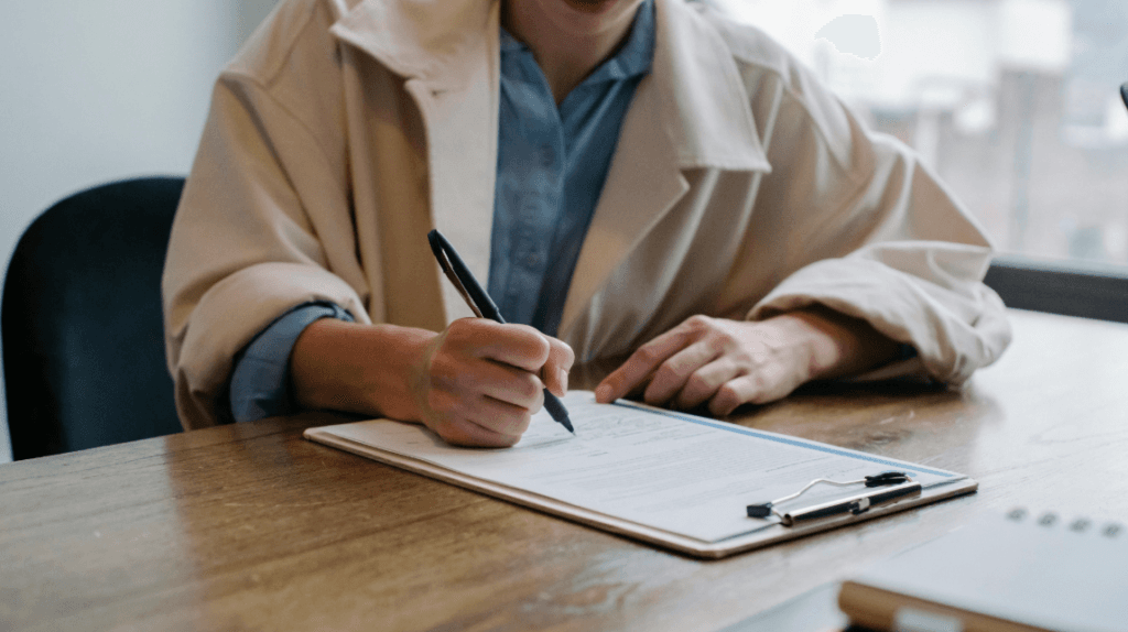 Person filling out pre-employment health questionnaire