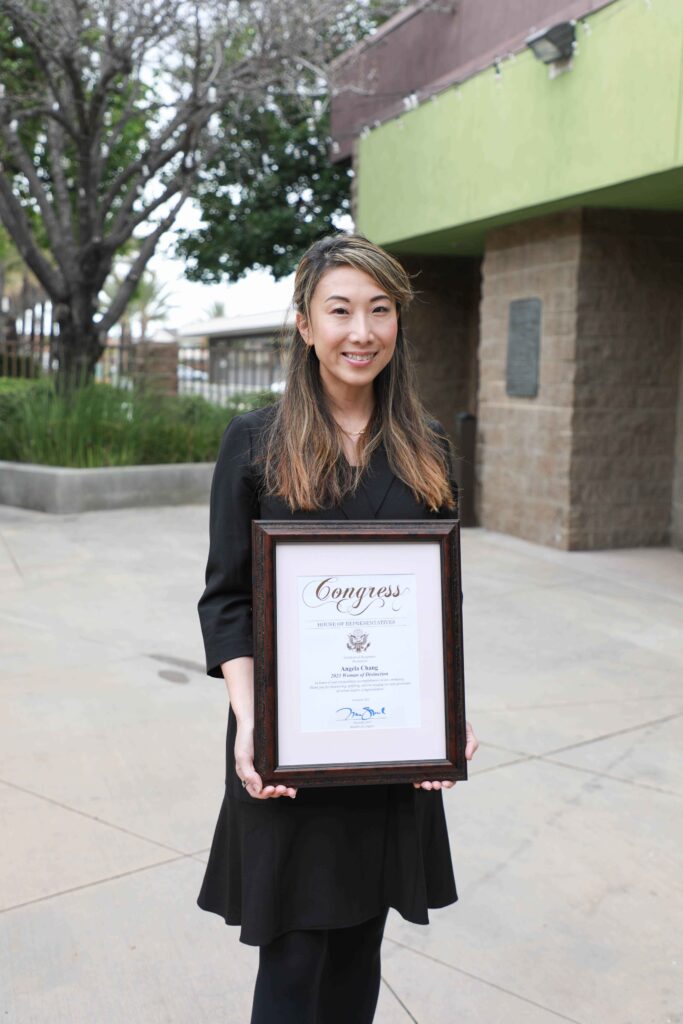 angela chang with certificate
