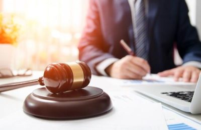 Wooden gavel on table. Attorney working in courtroom. Wooden gavel on table. Attorney working in courtroom. law attorney court judge justice gavel legal legislation concept